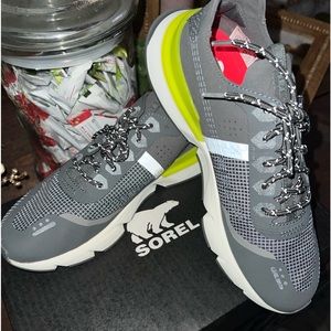 Sorel Kinetic Rush Glow size 9.5. Grey with yellow and reflective gray.